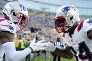 Kendrick Bourne #84 of the New England Patriots and DeVante Parker #1 of the New England Patriots celebrate a Parker TD