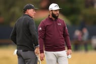 Jon Rahm and Phil Mickelson (via Getty Images)