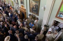 Usman Khawaja engages in a heated verbal exchange with English fans in the Long room during Lunch break on Day 5 of 2nd Ashes Test