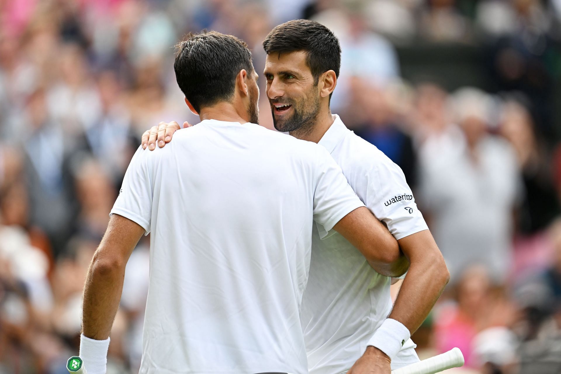 Novak Djokovic (right) at Wimbledon 2023