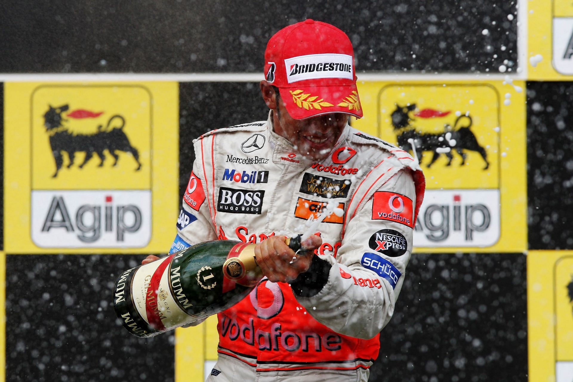 Lewis Hamilton celebrates his first Hungarian Grand Prix victory with McLaren in 2007 (Photo by Mark Thompson/Getty Images)