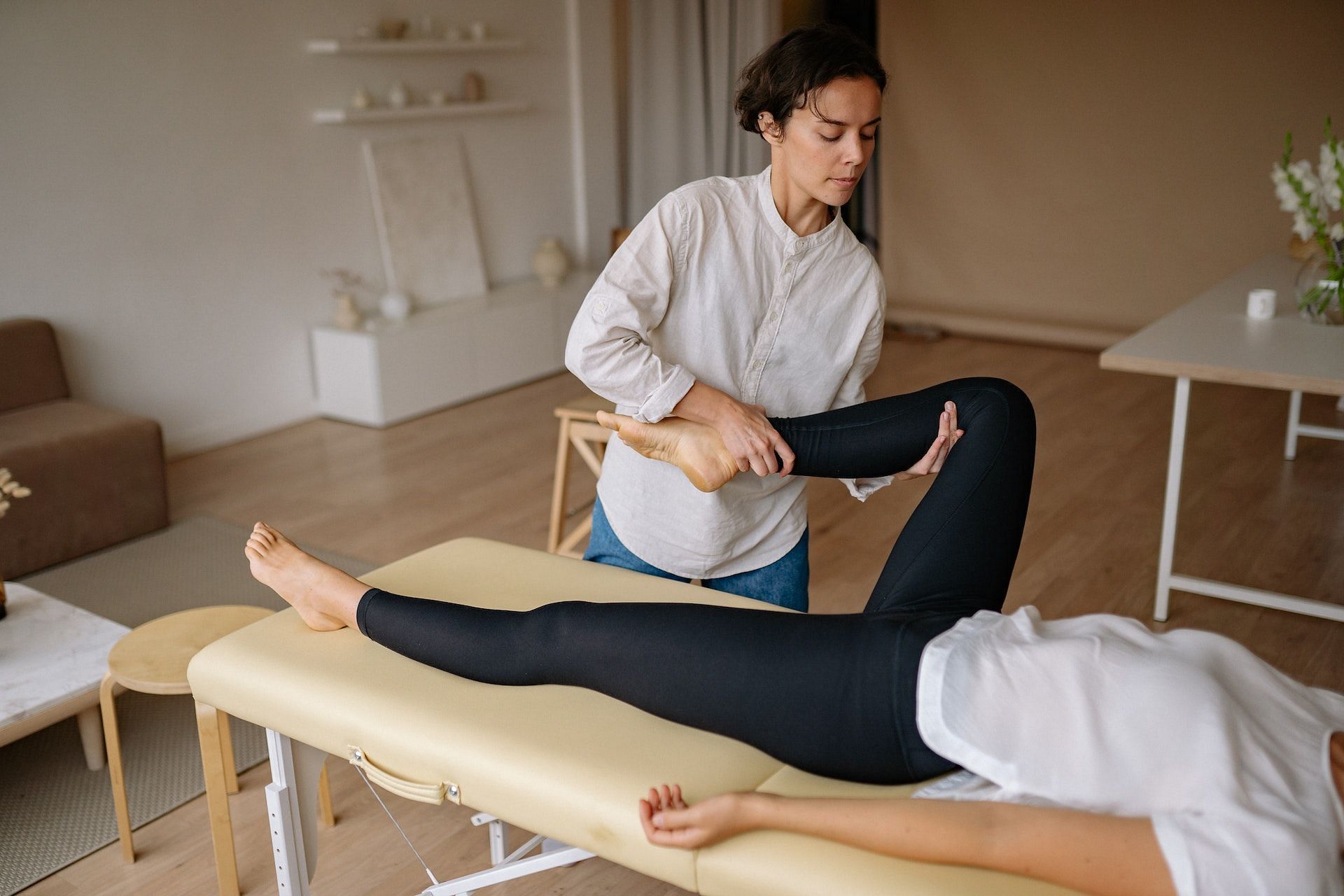 Getting a leg massage can help. (Photo via Pexels/Yan Krukau)