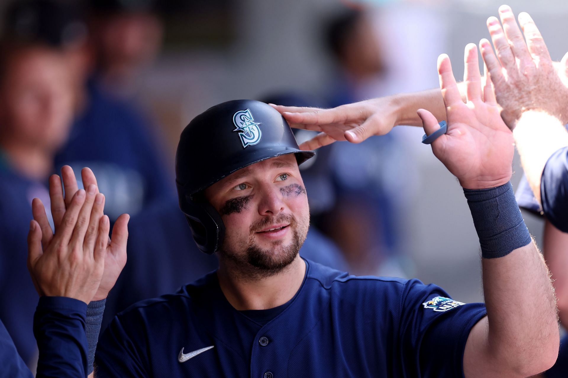 Cal Raleigh #29 of the Seattle Mariners celebrates a run against the Minnesota Twins during the eighth inning at T-Mobile Park on July 20, 2023 in Seattle, Washington. (Photo by Steph Chambers/Getty Images)