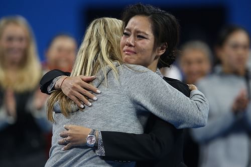 Petra Kvitova hugging Li Na at the latter's retirement ceremony.