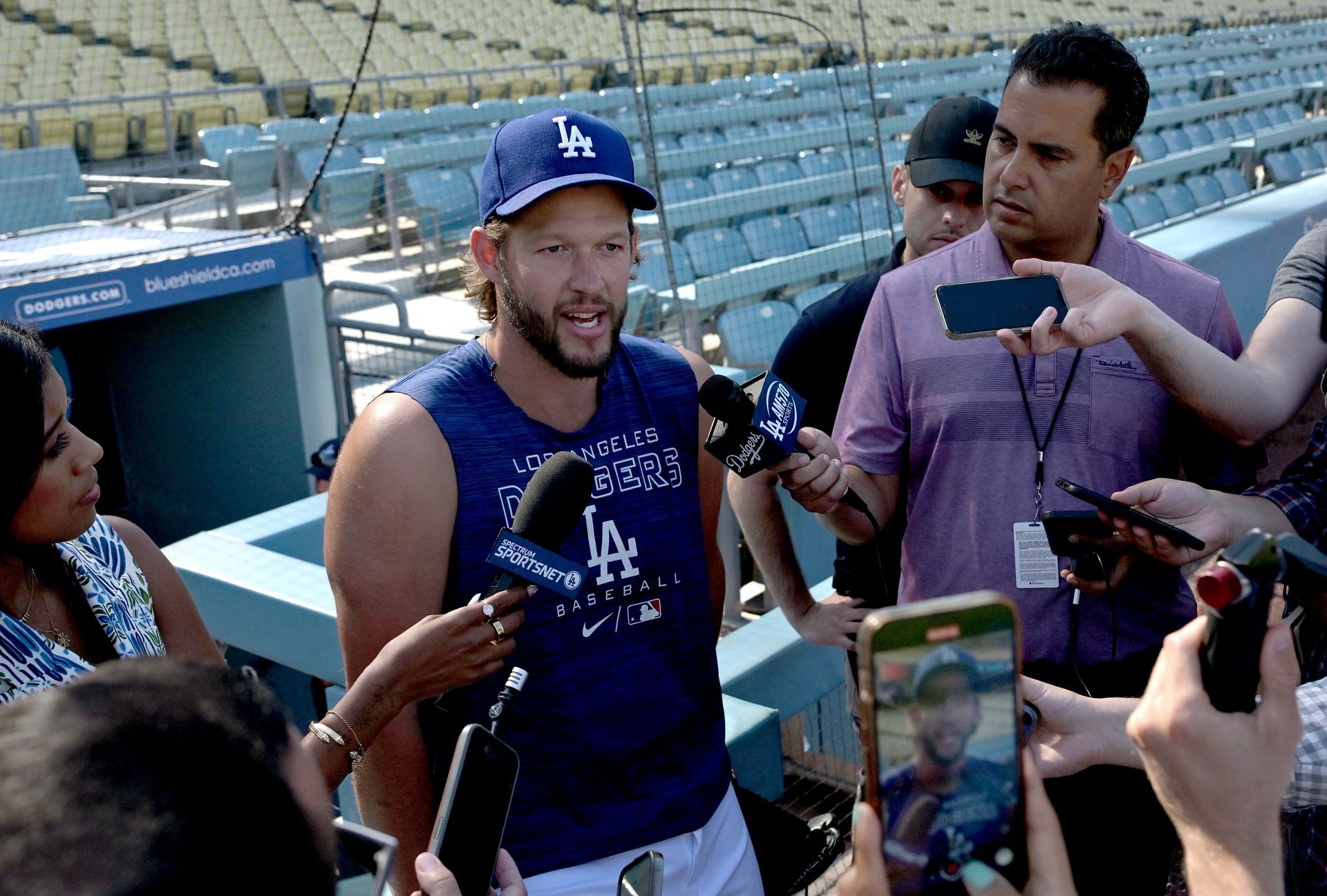Clayton Kershaw talks to the media after it was announced he was put on the on 15-day IL at Dodger Stadium