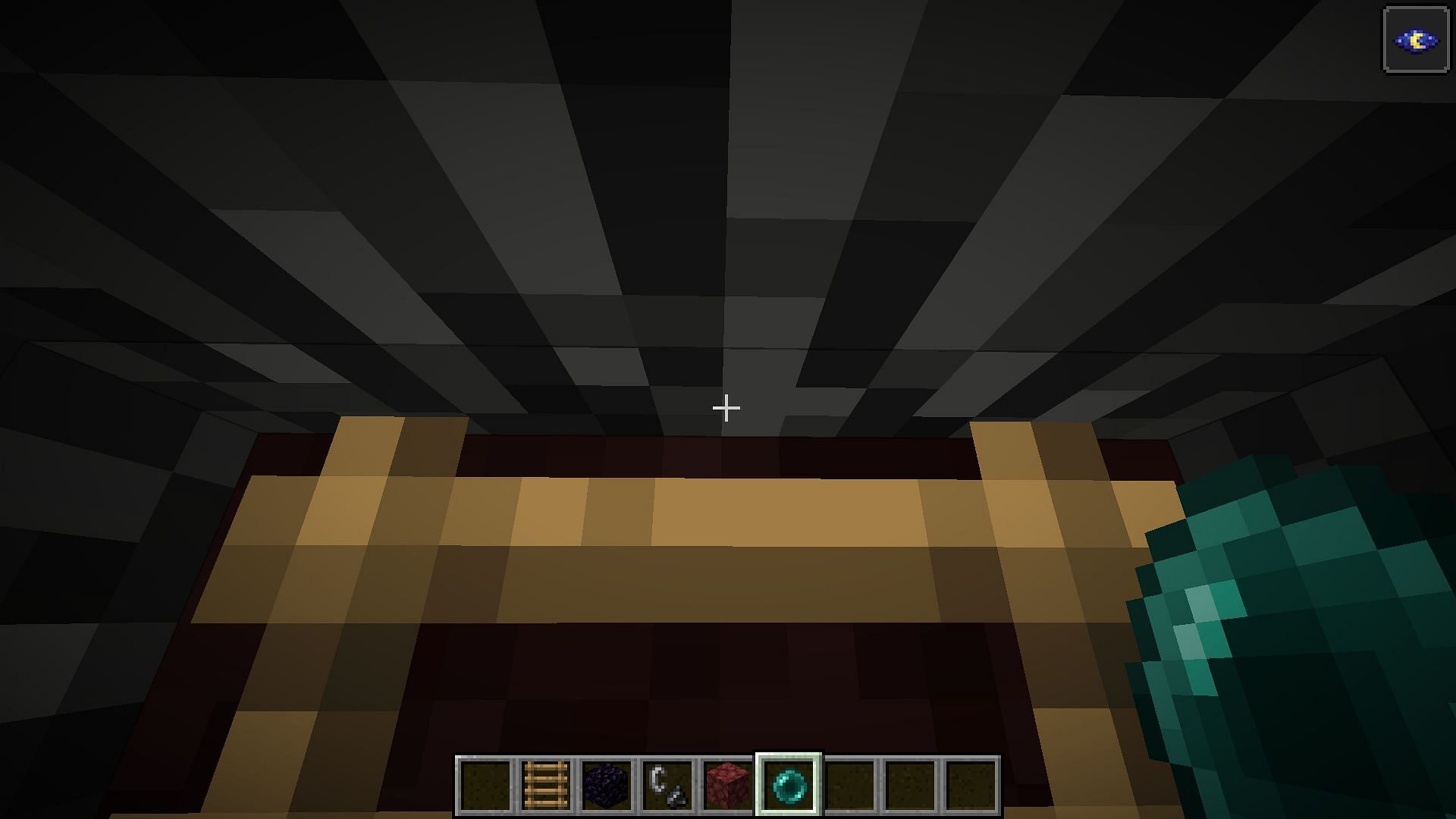 Throw ender pearl at the edge to teleport to the Nether ceiling in Minecraft (Image via Mojang)