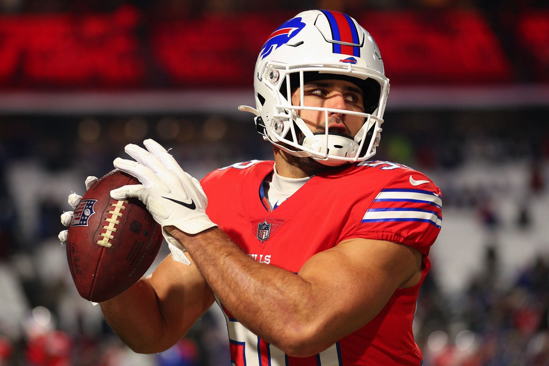 Buffalo Bills quarterback Josh Allen (17) is forced out of the pocket by  Baltimore Ravens defensive back Chuck Clark (36) and Matt Judon (99) during  the second half of an NFL football