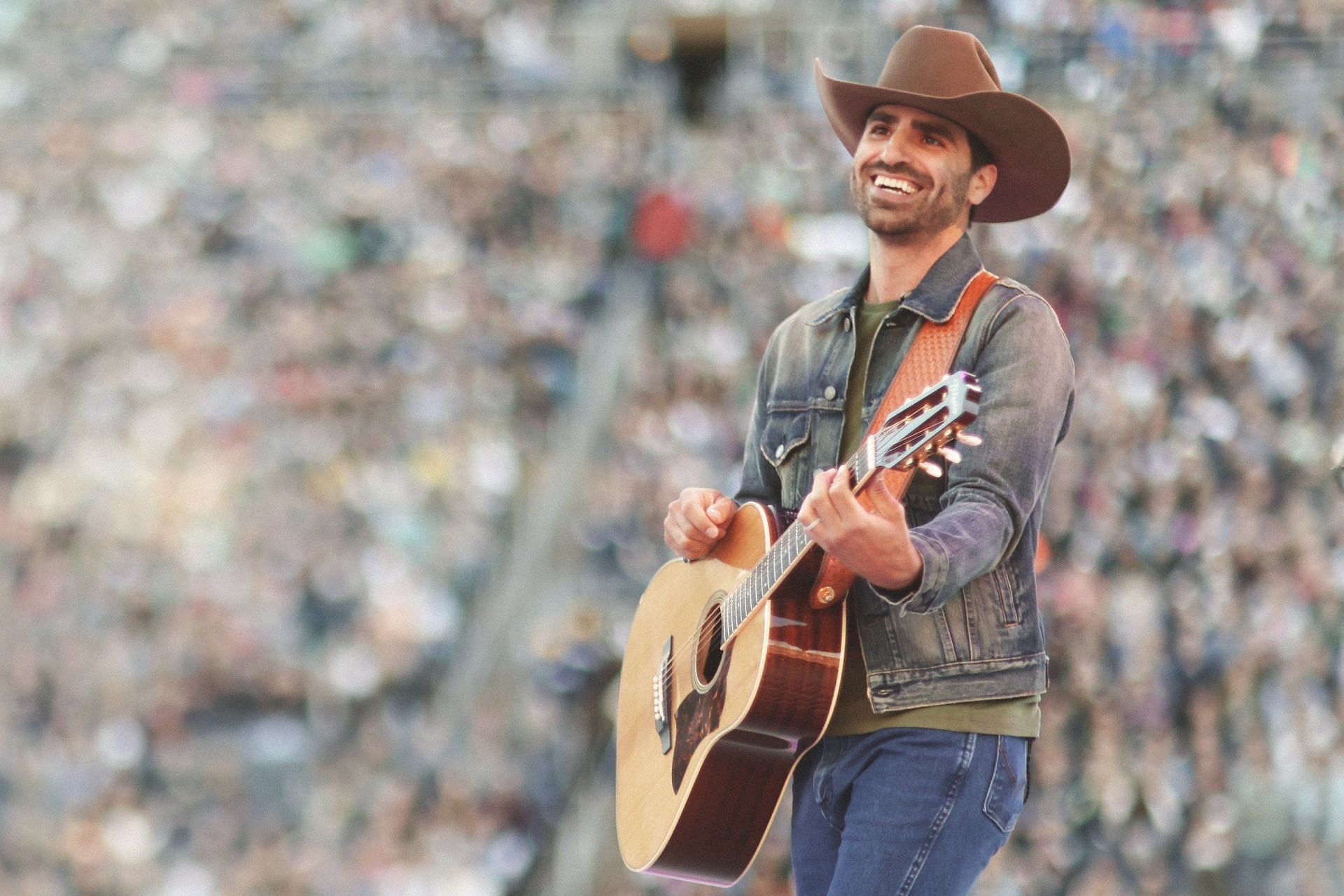 How many songs has Mitch Rossell released? Country singer makes it to