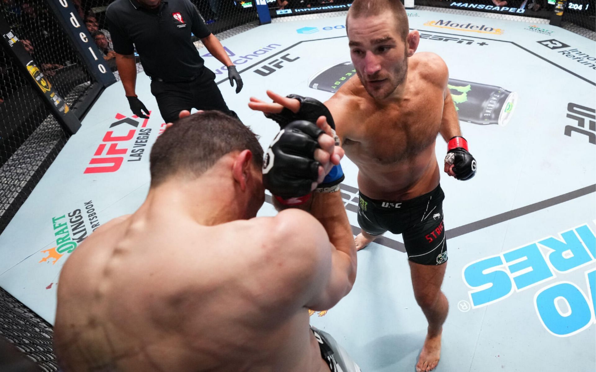 Sean Strickland (Right) during his latest octagon appearance in July 2023 [*Image courtesy: UFC.com]