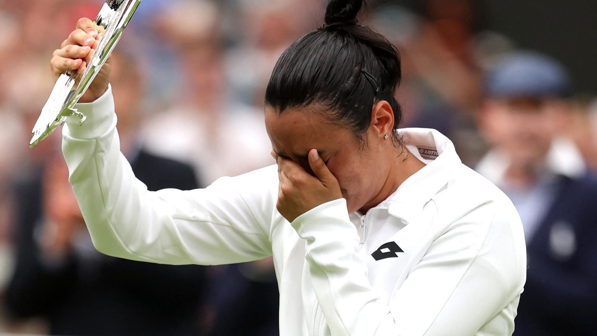Ons Jabeur cries during the 2023 Wimbledon trophy ceremony
