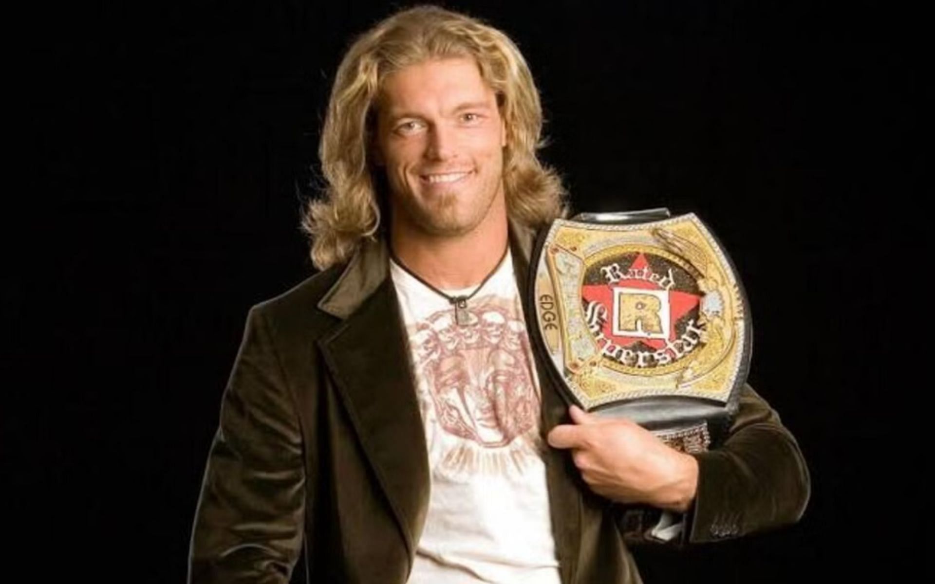 Edge with his customized version of the spinner belt