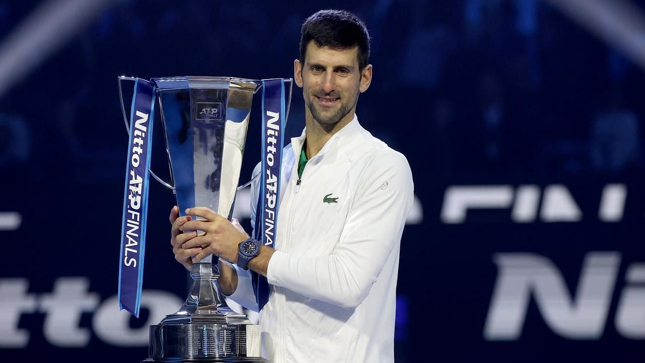 The Serb poses with the 2022 ATP Finals title