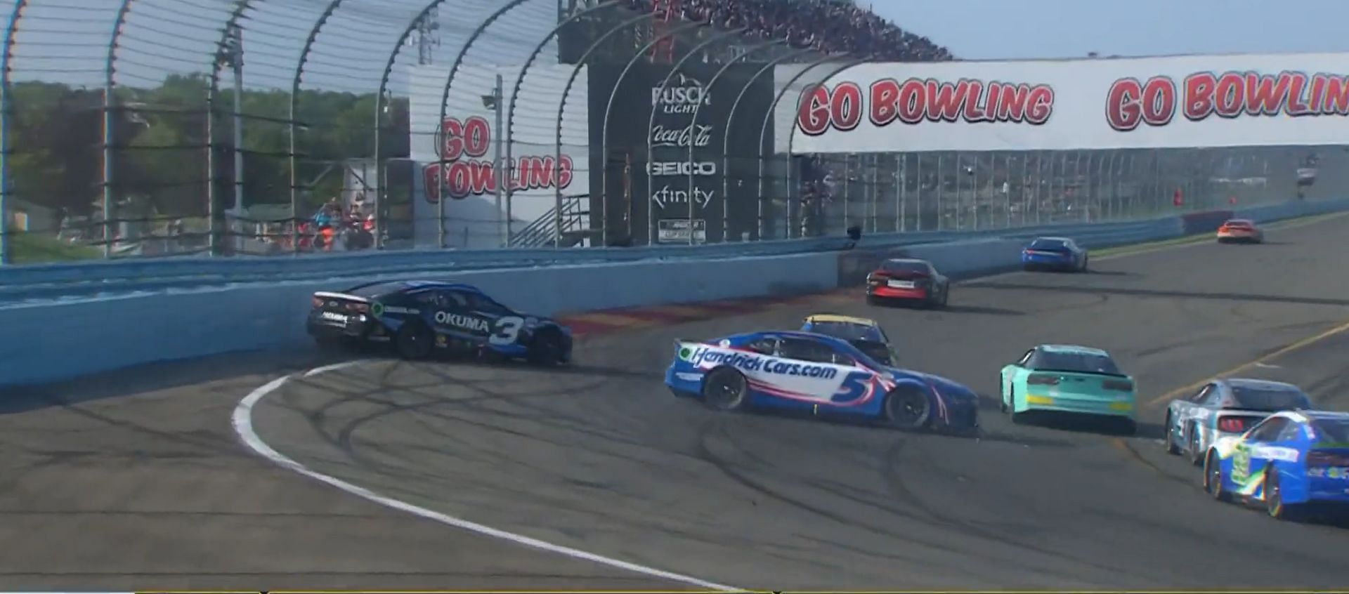 NASCAR Cup Series drivers Austin Dillon (#3) and Kyle Larson (#5) spin on the last lap after making contact with each other during the Cup Series race at Watkins Glen International