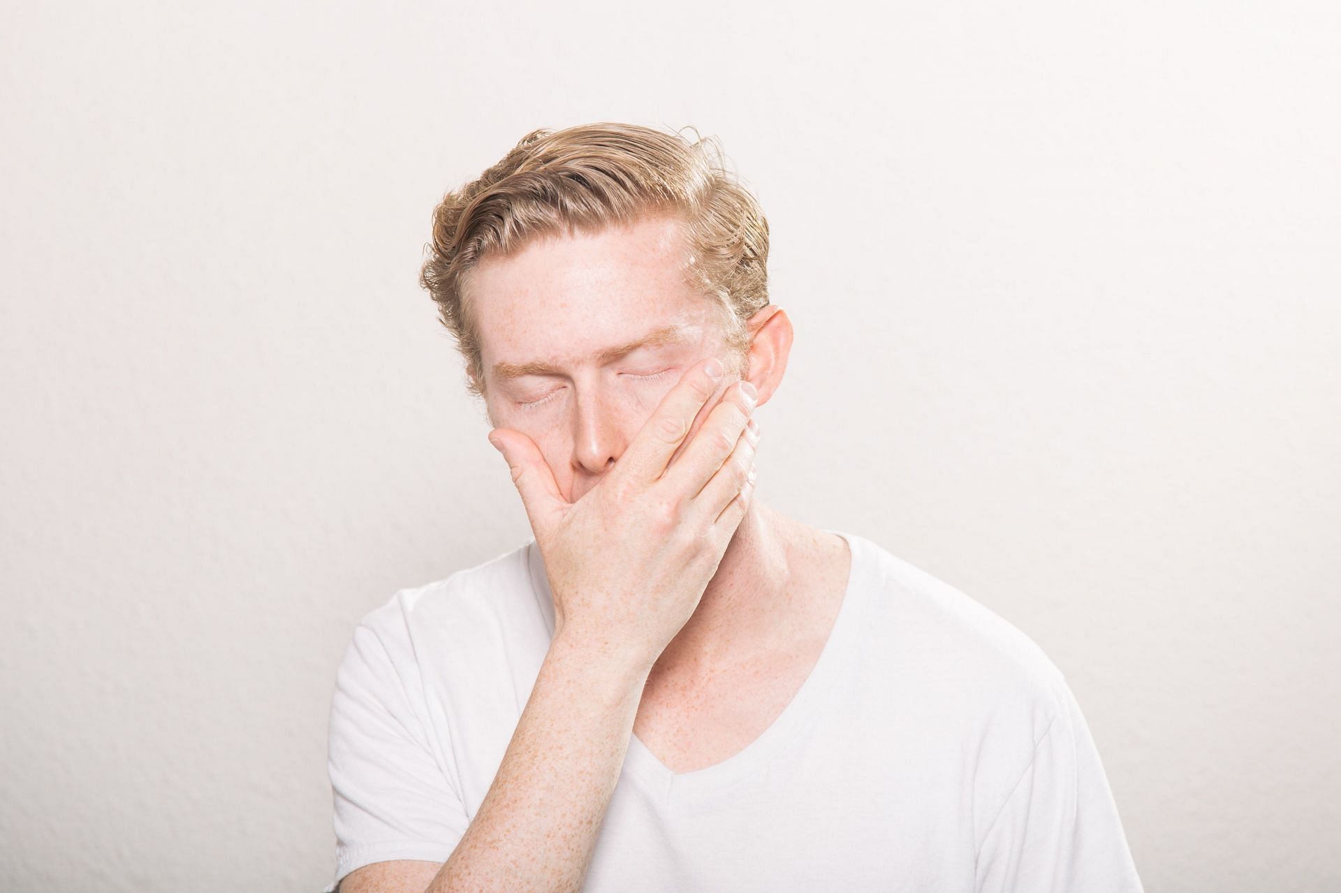 Nausea and headaches are the most common symptoms. (Image via Unsplash/Kyle Glenn)