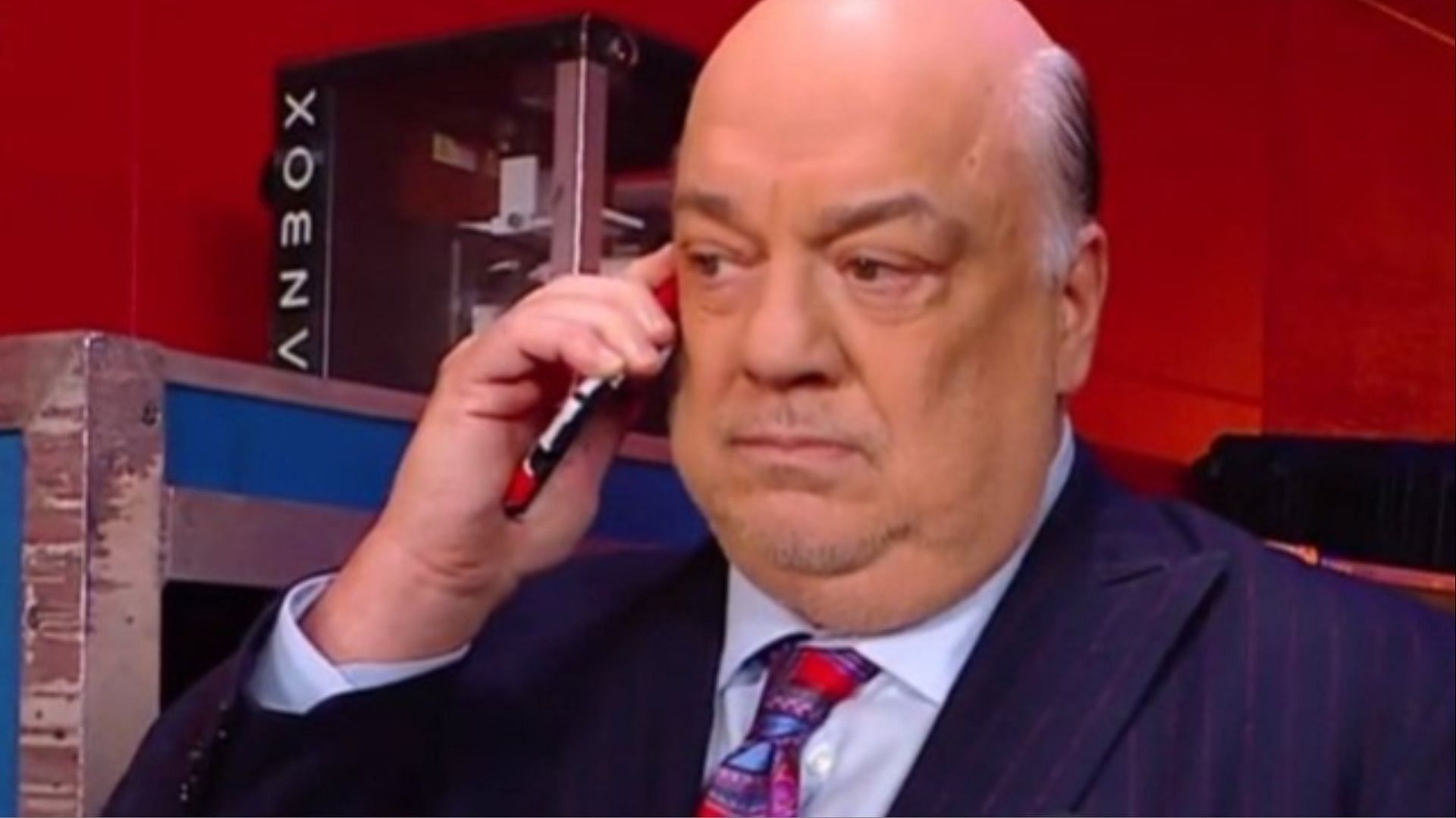 Paul Heyman was on the phone with someone on WWE SmackDown.