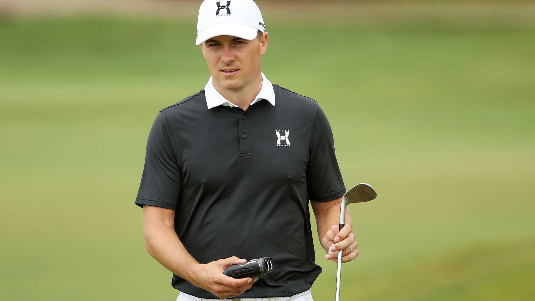 Jordan Spieth with a rangefinder at the PGA Championship (Image via Getty)