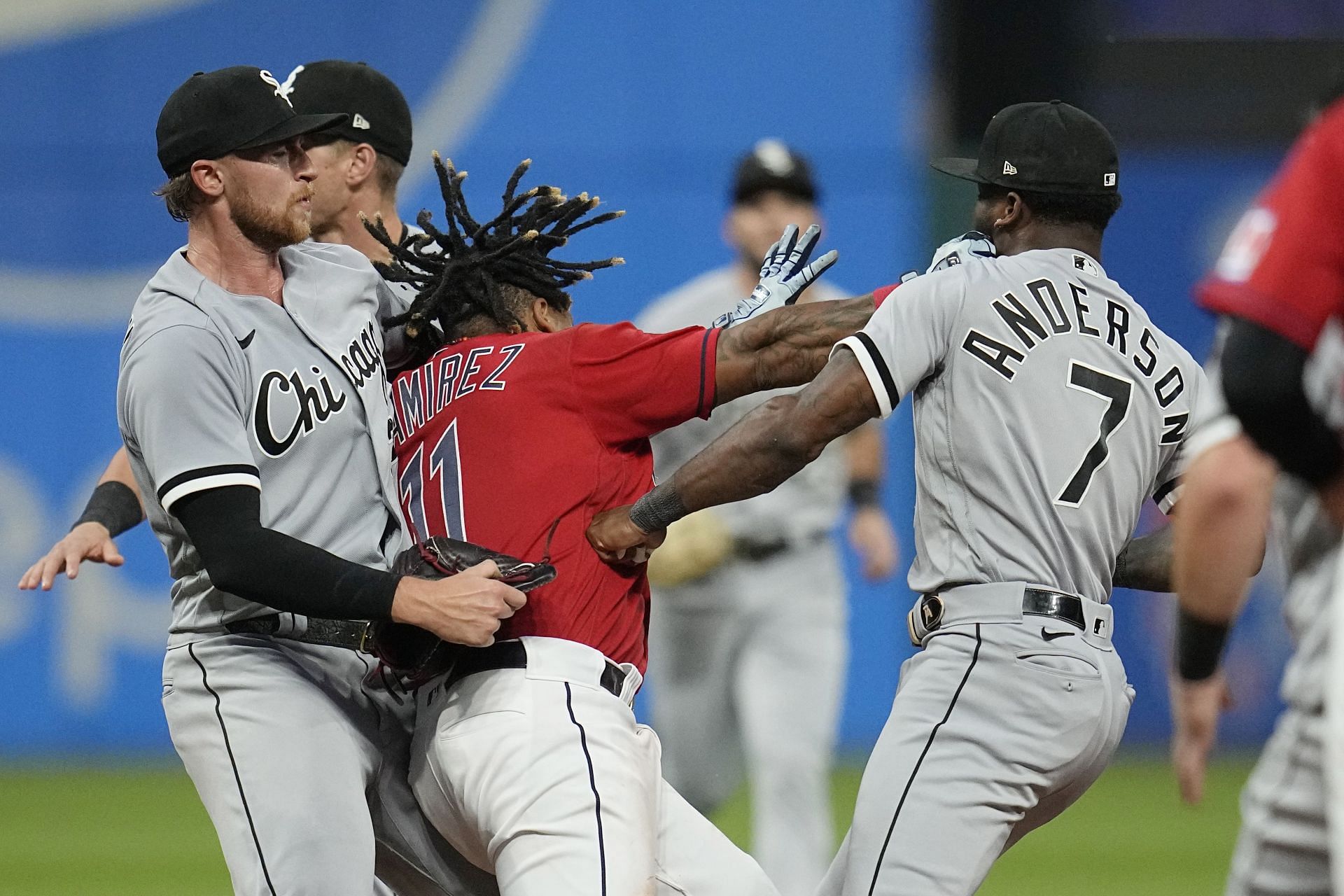 APTOPIX White Sox Guardians Baseball: Cleveland Guardians&#039; Jose Ramirez, center, and Chicago White Sox&#039;s Tim Anderson (7) exchange punches in the sixth inning of a baseball game Saturday, Aug. 5, 2023, in Cleveland. White Sox Michael Kopech, left, looks on. (AP Photo/Sue Ogrocki)