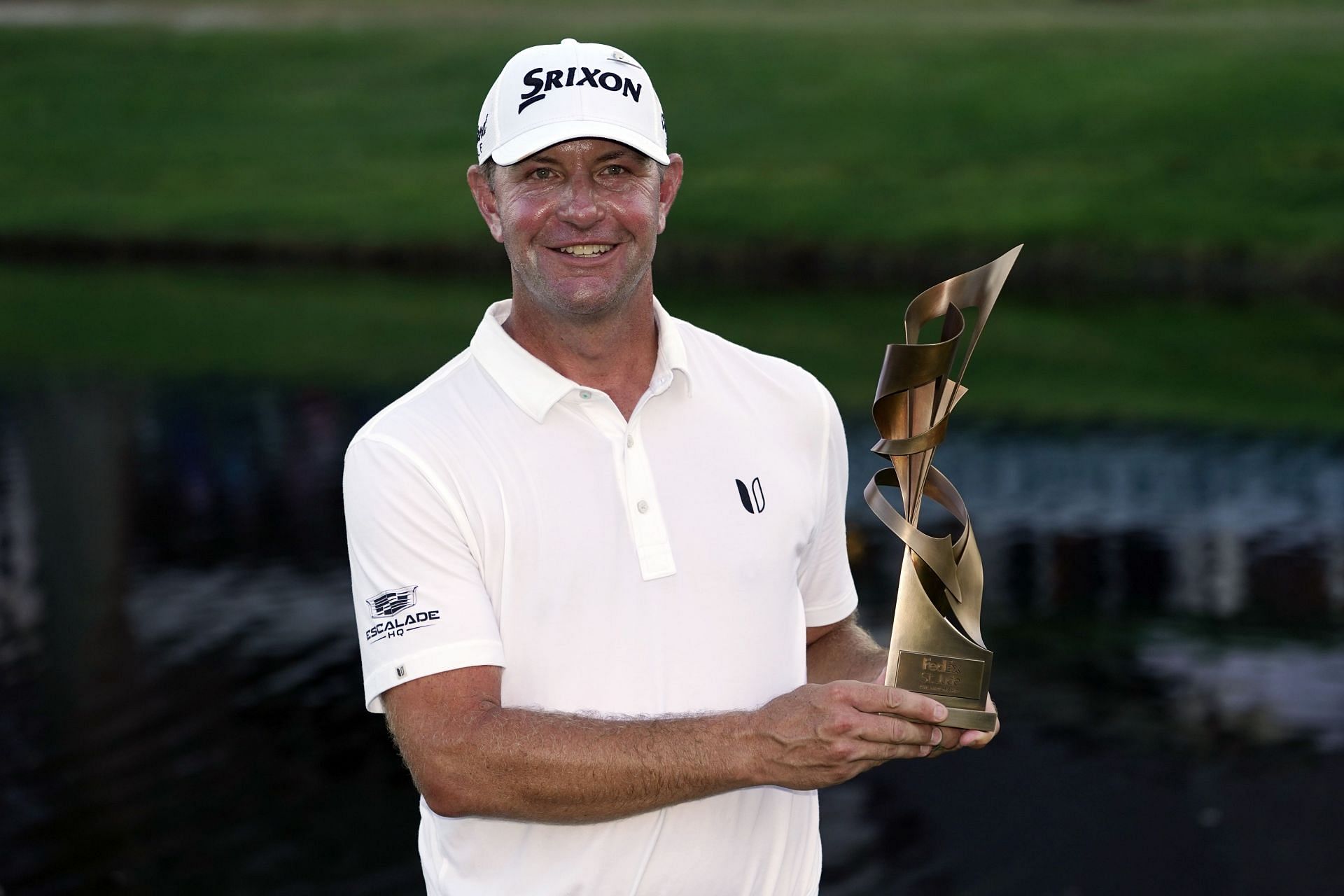 Lucas Glover with the 2023 FedEx St. Jude Championship Trophy (via Getty Images)