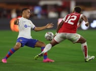 Sergino Dest (left) remains linked with an exit from the Camp Nou.