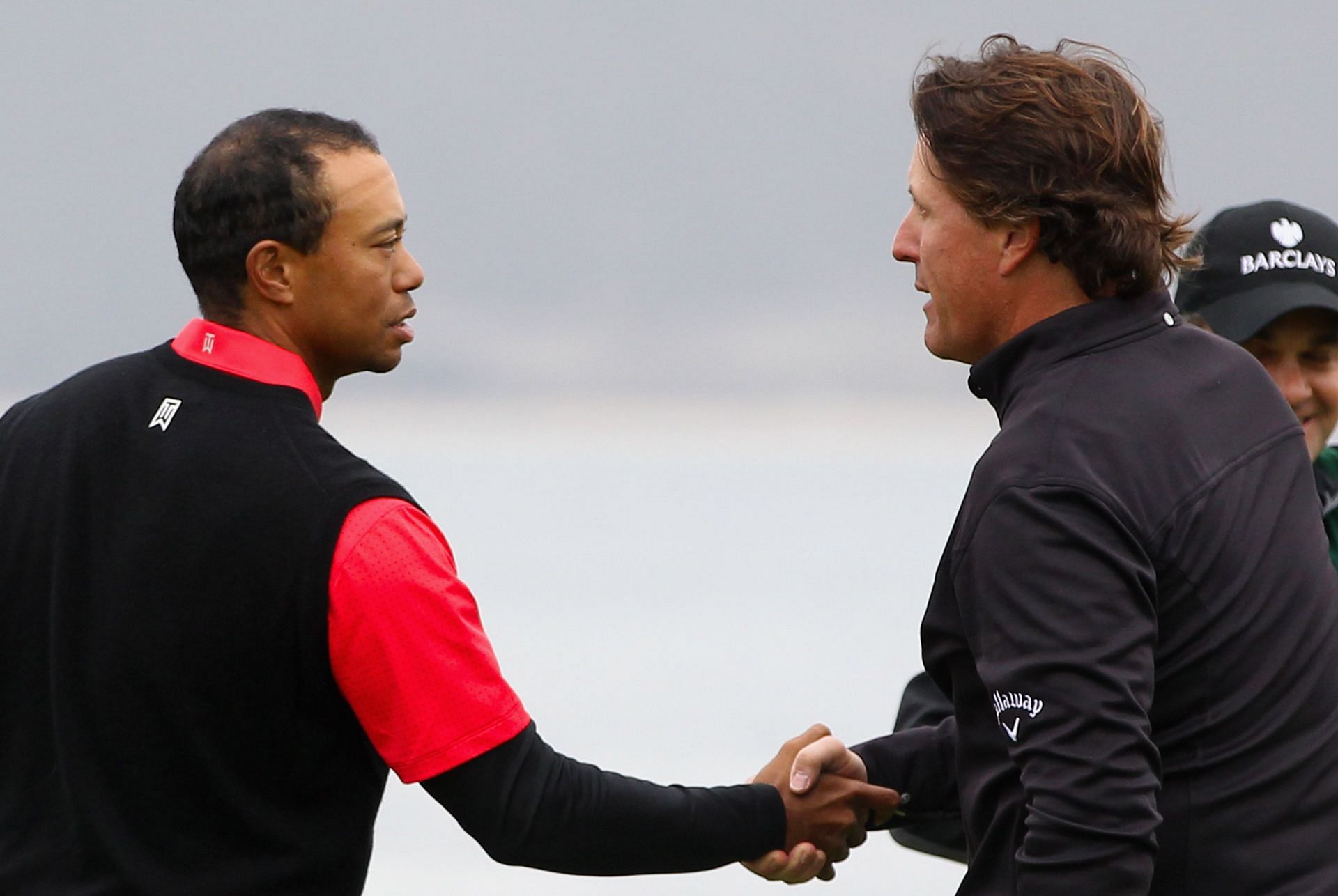 Tiger Woods and Phil Mickelson (via Getty Images)