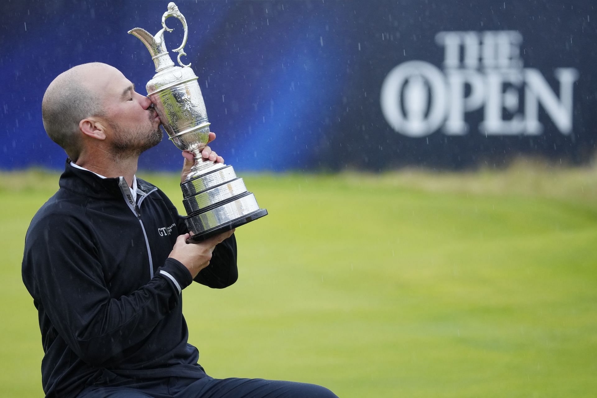 Brian Harman kisses the Claret Jug after winning the 151st Open Championship