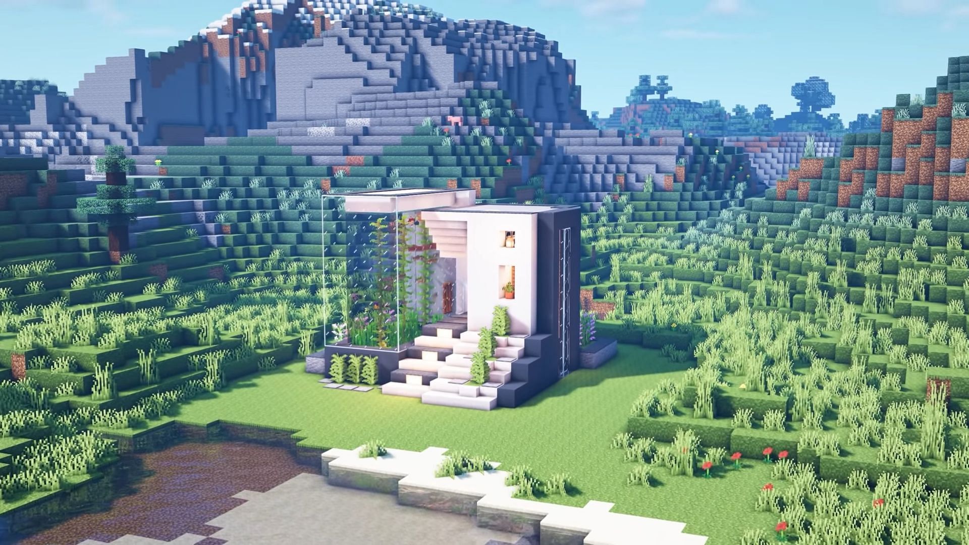 This Minecraft house has a magnificent aquarium on its exterior (Image via SheepGG/YouTube)