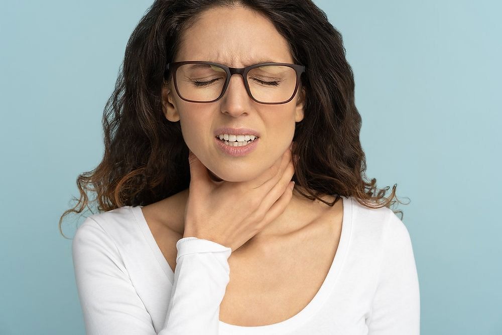 Swallowing mouthwash (Image via Getty Images)