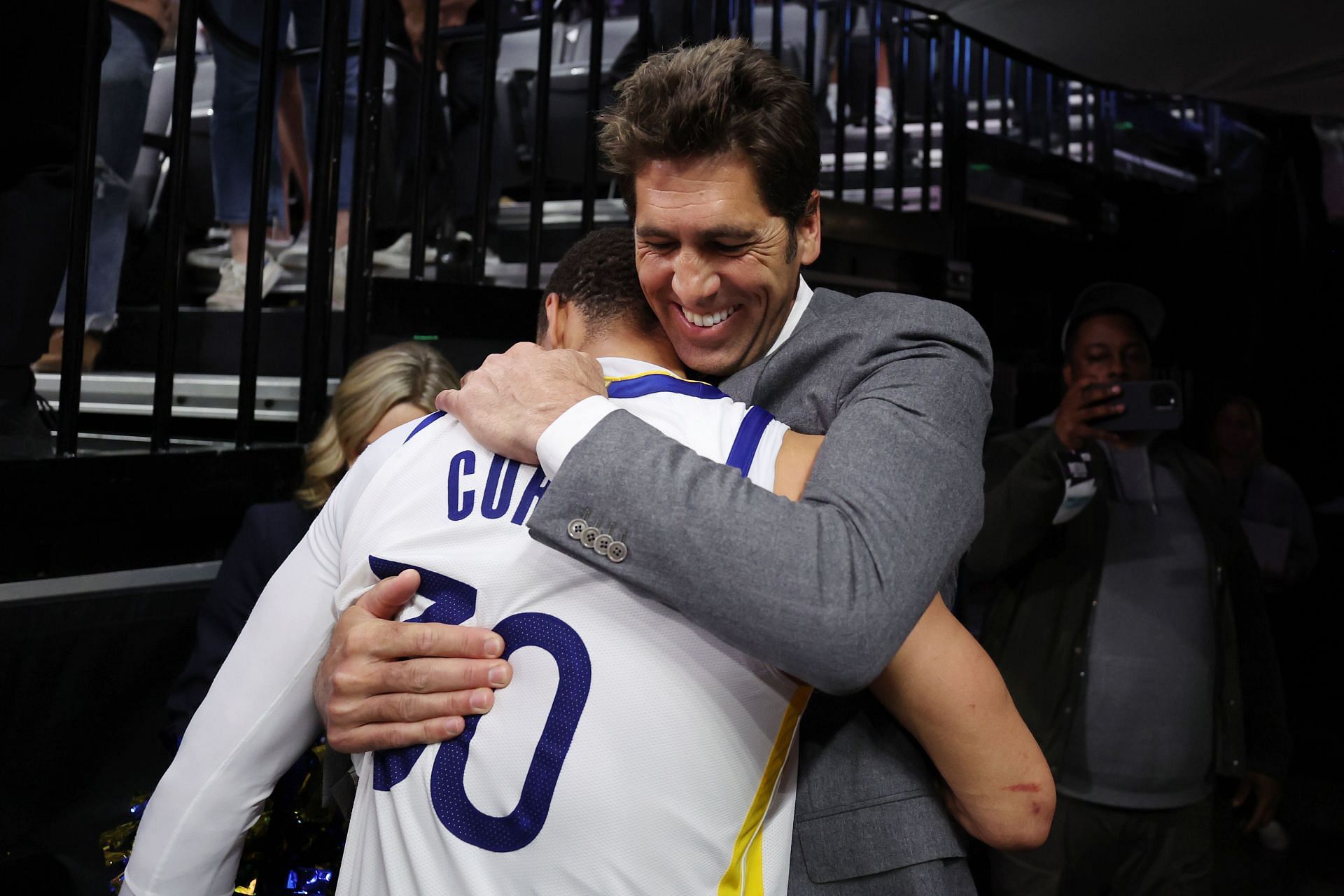 Steph Curry, left, and Bob Myers