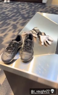 The image of Dallas Cowboys rookie running back Deuce Vaughn's cleats and gloves (via CeeDee Lamb's Instagram account)