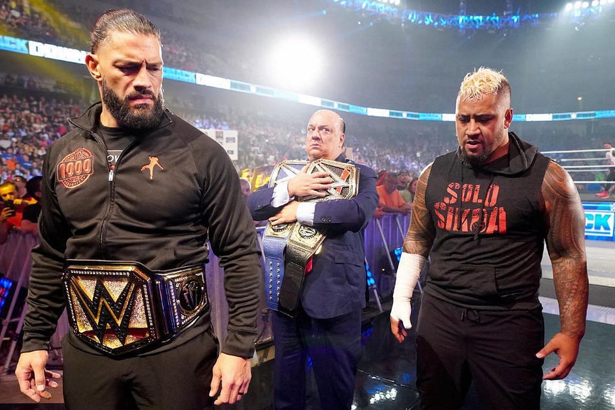 Roman Reigns, Paul Heyman and Solo Sikoa during an episode of WWE SmackDown.
