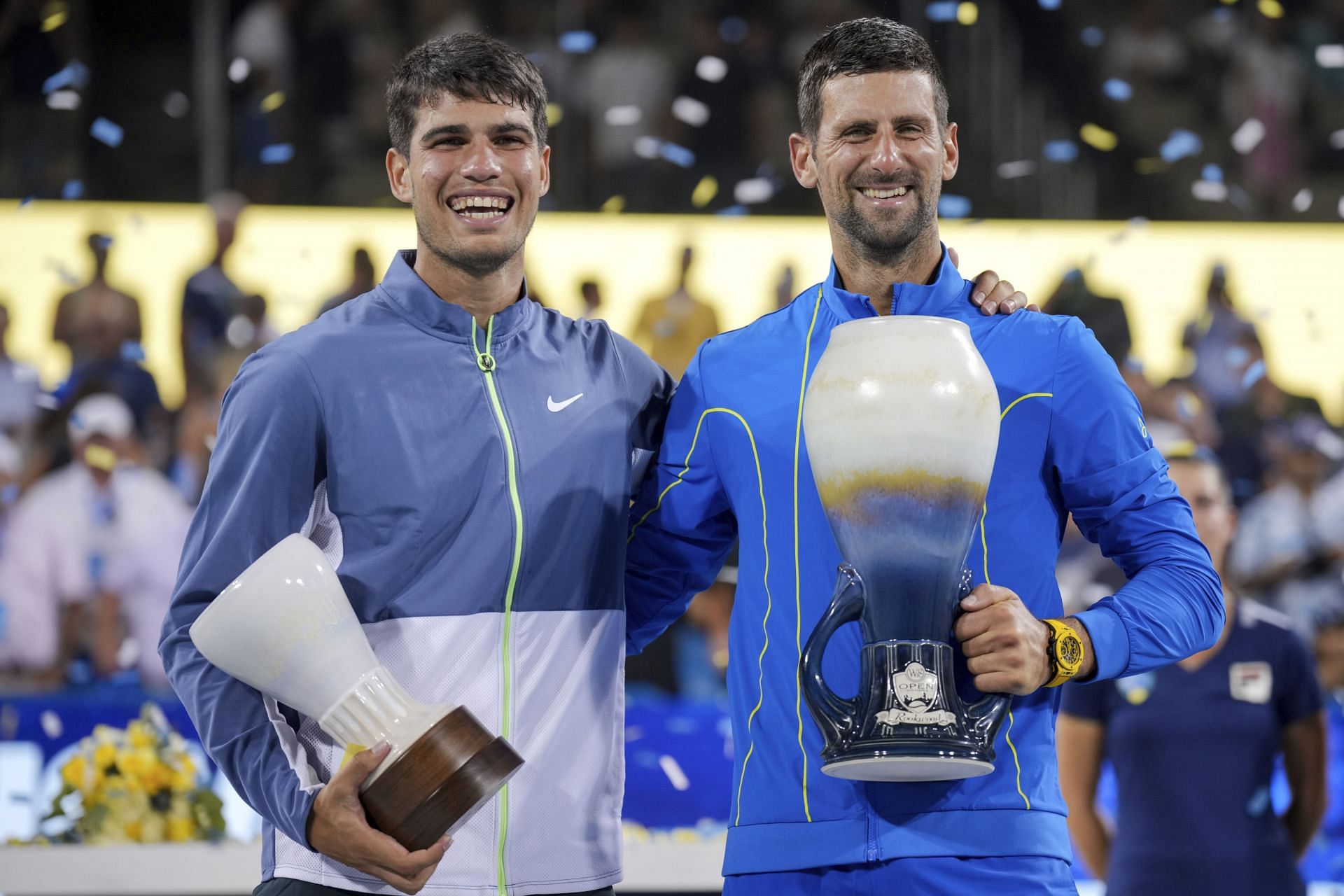 Novak Djokovic with the 2023 Cincinnati Open trophy (right) and Carlos Alcaraz with the runner up&#039;s trophy(left)