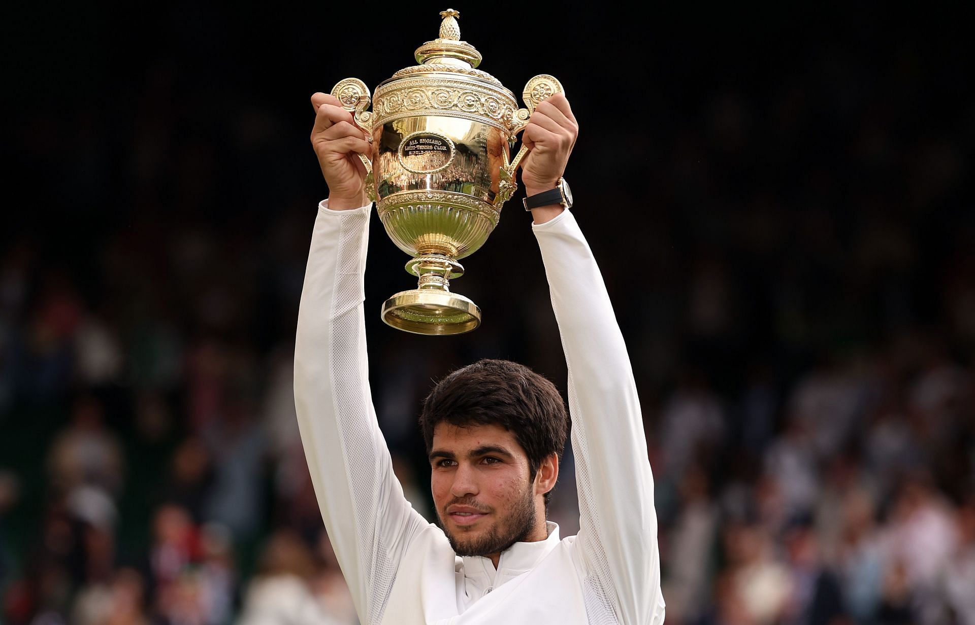 Carlos Alcaraz with the trophy after winning the 2023 Wimbledon Championship