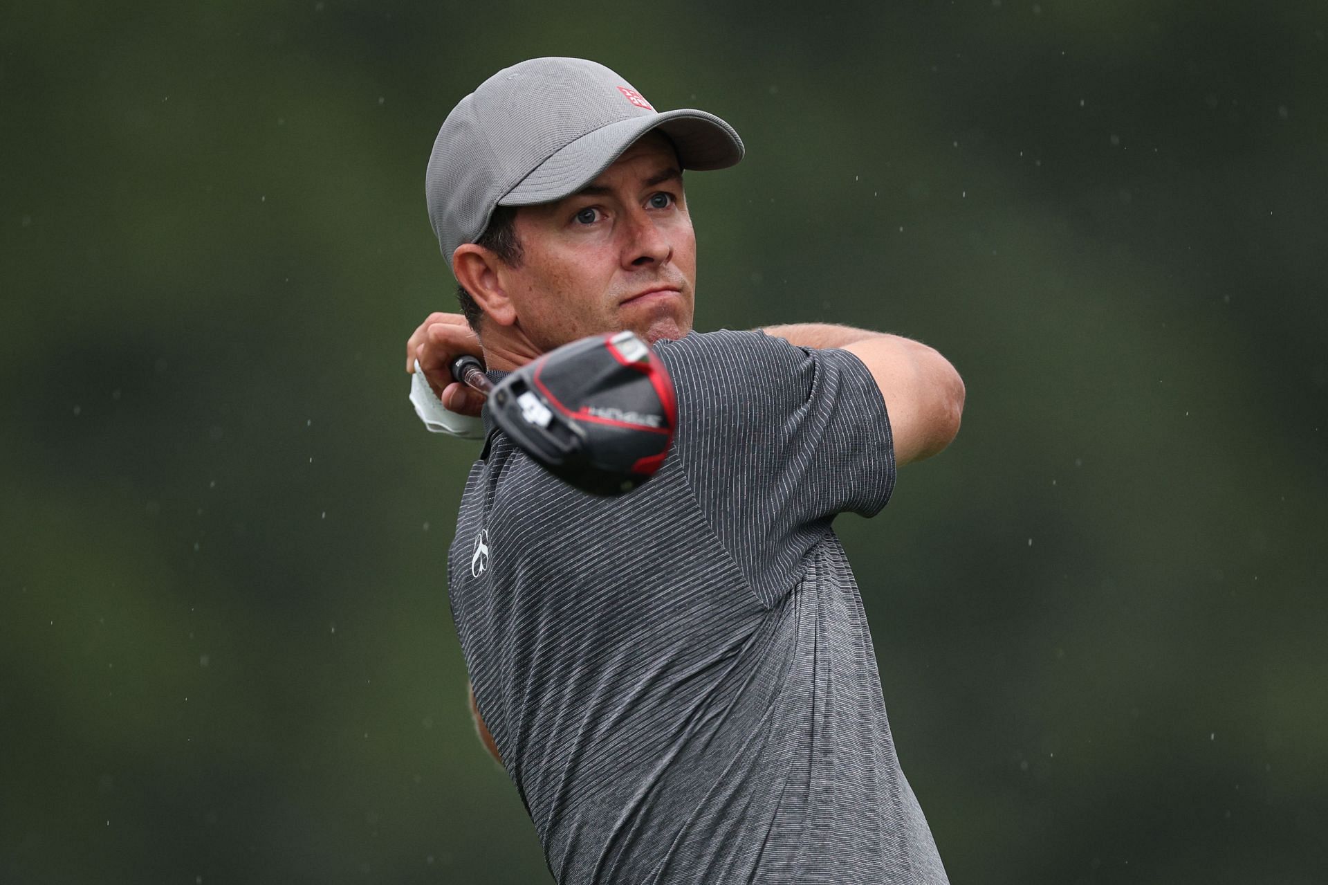 Adam Scott plays his shot from the 11th during the first round of the 2023 Wyndham Championship