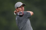 Adam Scott plays his shot from the 11th during the first round of the 2023 Wyndham Championship
