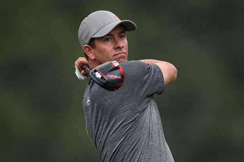 Adam Scott plays his shot from the 11th during the first round of the 2023 Wyndham Championship