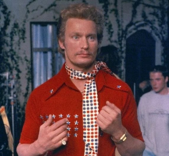 Does Woody Harrelson have a twin brother?