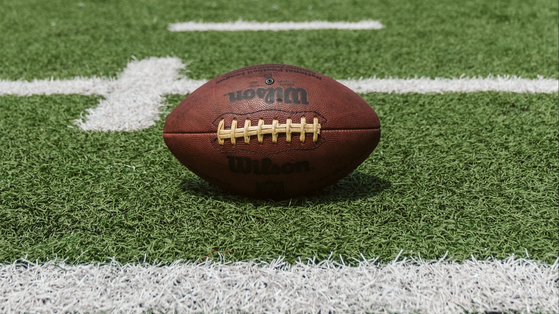 A High School football coach came under fire after punching a student (Photo by Dave Adamson on Unsplash)