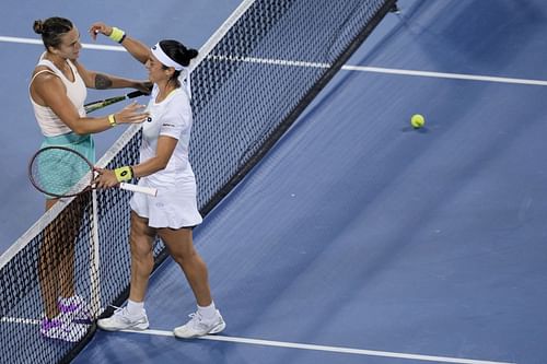 Sabalenka and Jabeur share a moment after their Cincinnati quarter-finals matchup