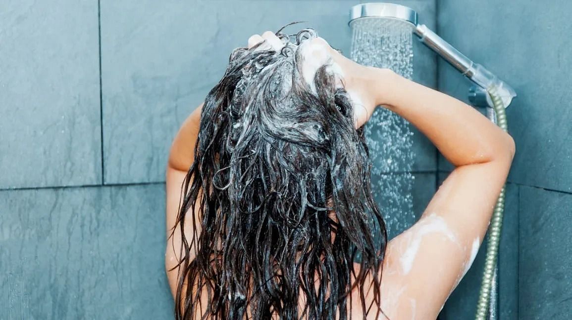 Wash your hair (Image via Getty Images)