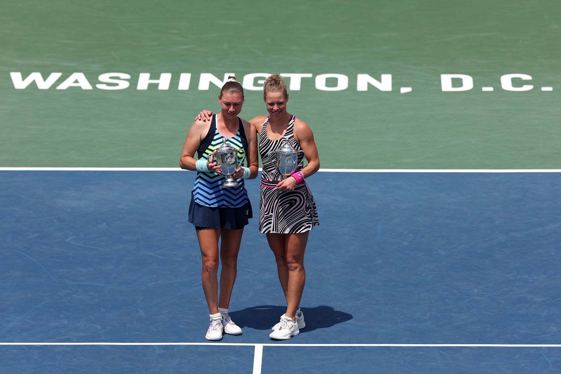 Vera Zvonareva and Laura Siegemund with the women&#039;s doubles title at the Citi Open