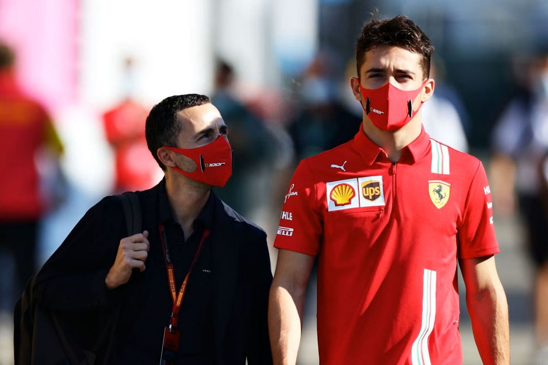 Charles Leclerc walks in the paddock with his manager Nicolas Todt before the 2020 F1 Turkish Grand Prix. (Photo by Peter Fox/Getty Images)