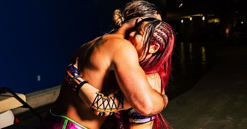 Seth Rollins and IYO SKY