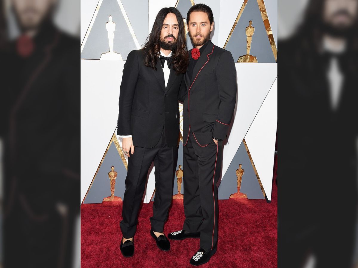 Jared Leto pairs pink suit with jeweled Gucci black gloves