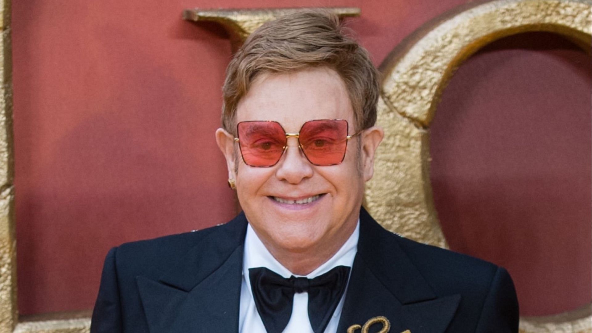 Elton John spent one night at a hospital after falling in his villa. (Image via David M. Benett/Getty Images)