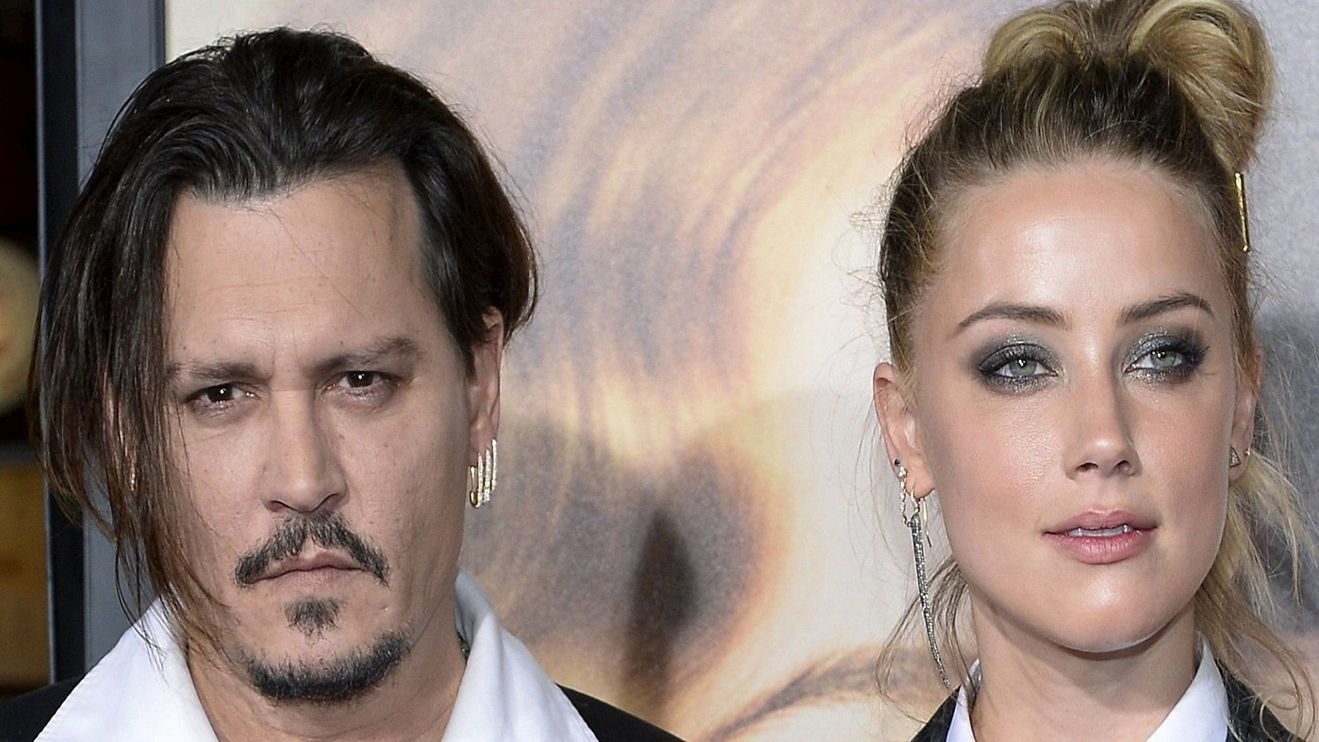 Johnny Depp and Amber Heard (Image via HuffPost)