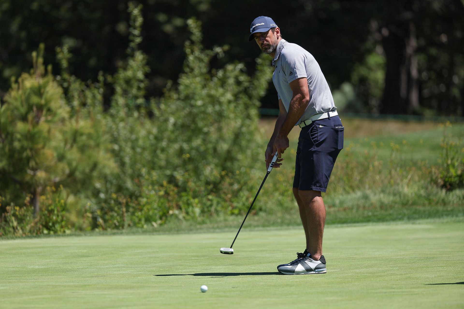 Aaron Rodgers on the course