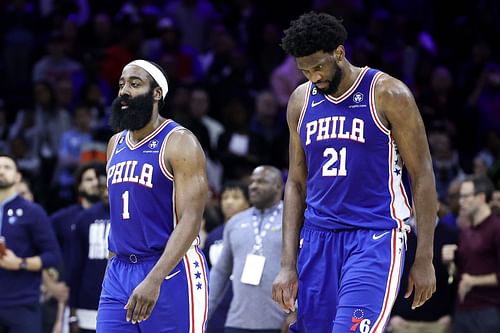 Joel Embiid of the Philadelphia 76ers with James Harden, left