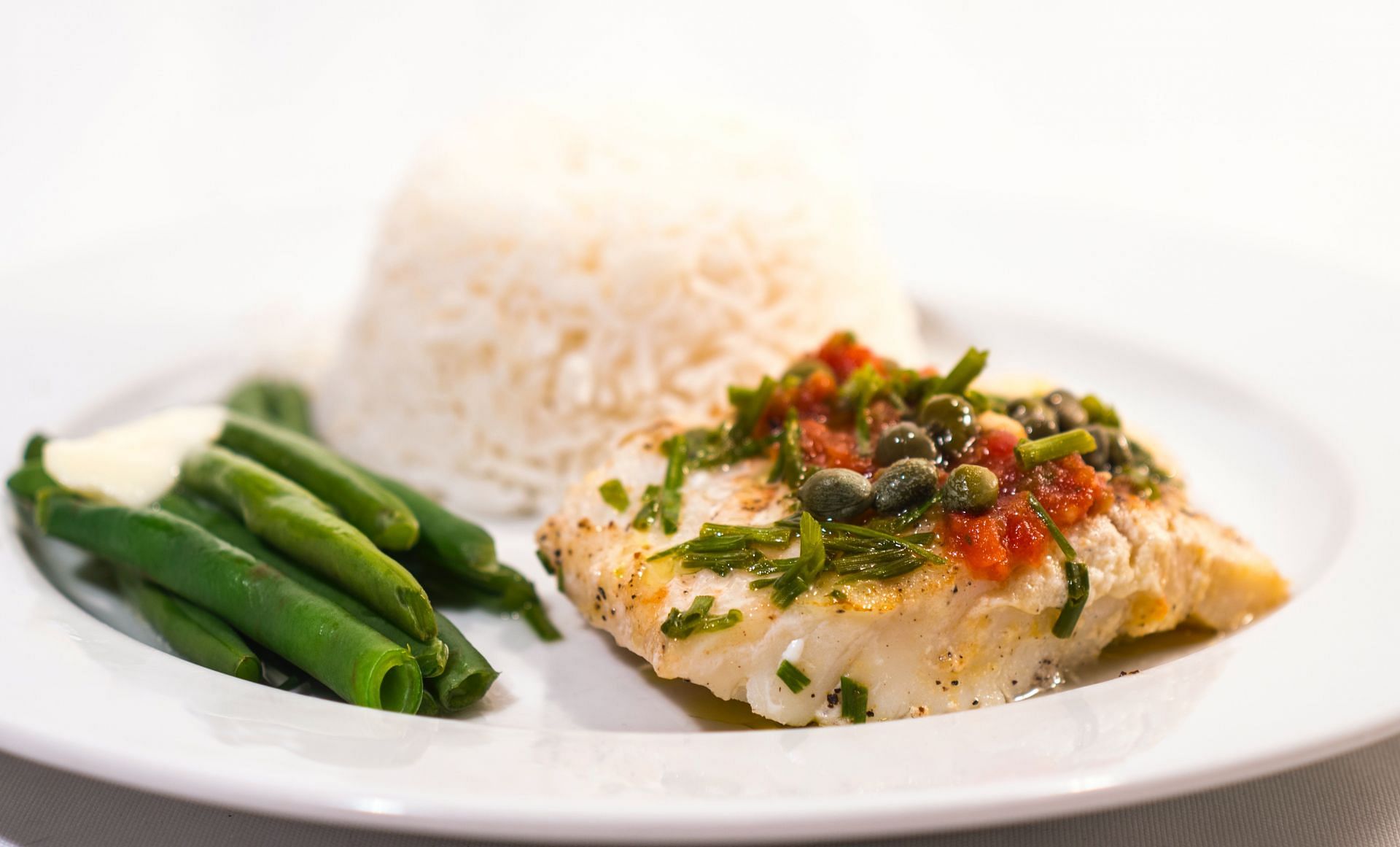 Cod is among the best high-protein low-calorie foods. (Image via Unsplash/David B Townsend)