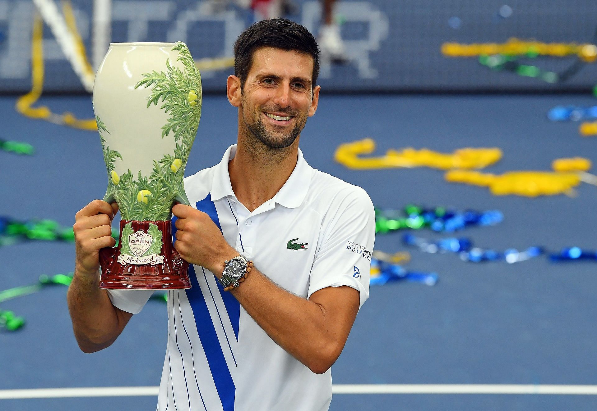 Novak Djokovic poses with the 2020 Cincinnati title