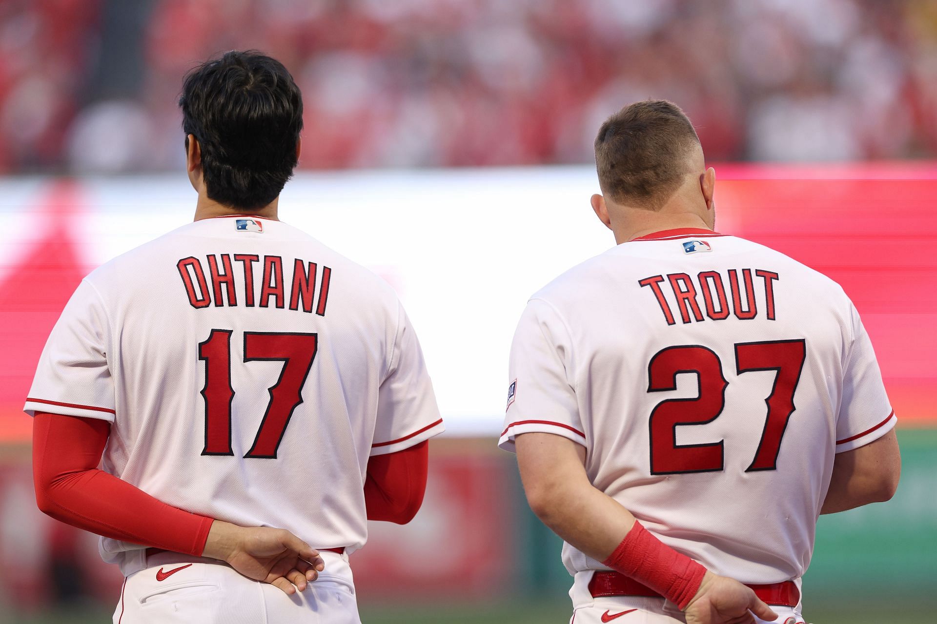 Shohei Ohtani and Mike Trout of the Los Angeles Angels line up for the National Anthem at Angel Stadium of Anaheim